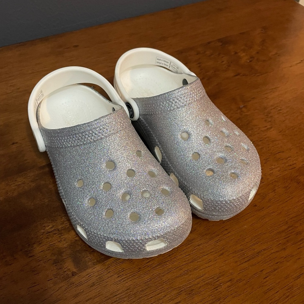 Silver sparkly Croc, size 2